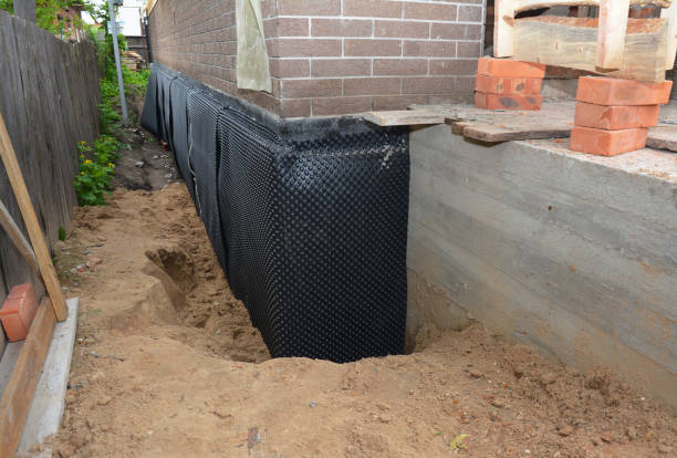 Happy homeowners after waterproofing job in Seaside Heights